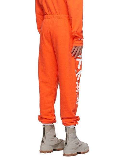 Heron Preston Orange Logo Print Elasticated-Waist Track Pants for men
