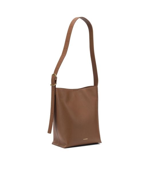 Jil Sander Brown Cannolo Logo Stamped Small Shoulder Bag