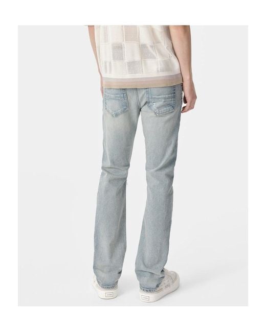 Amiri Blue Slash Jeans for men