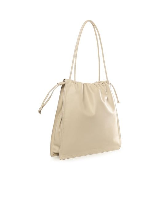 Coccinelle Natural Logo Embossed Drawstring Tote Bag