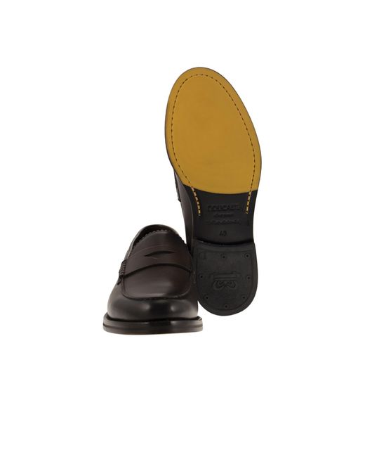 Doucal's Black Penny Slip-On Loafers for men