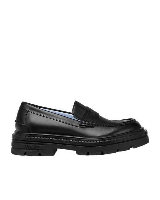 Versace Black Logo Embossed Loafers for men
