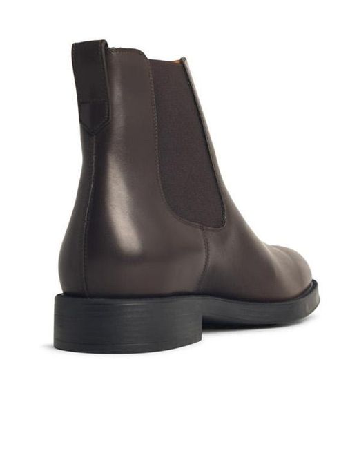 Tod's Black Round Toe Chelsea Boots for men