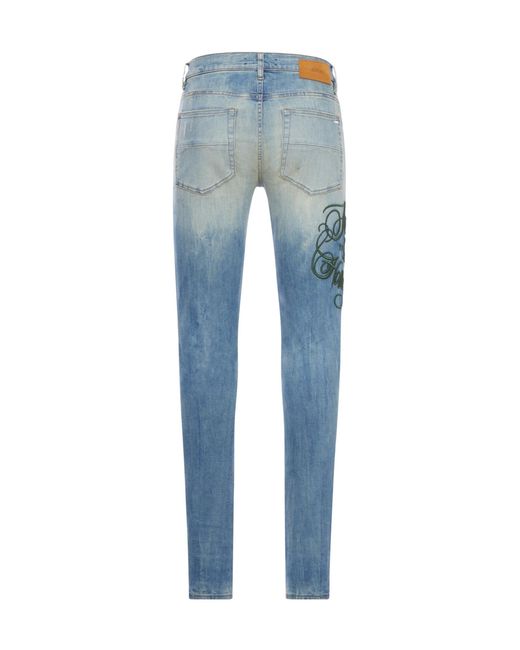 Amiri Blue Distressed Straight Leg Jeans for men