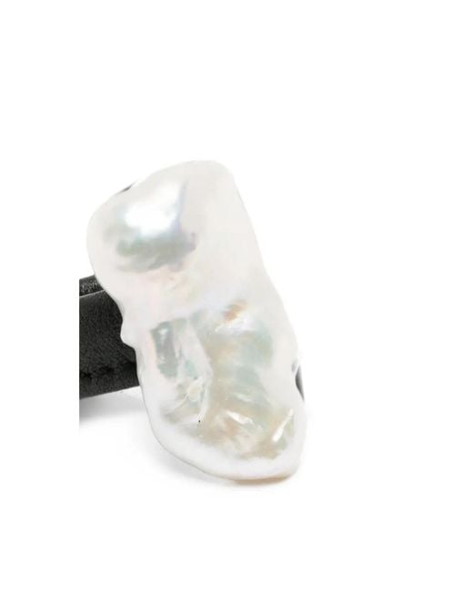Monies White Baroque Rings