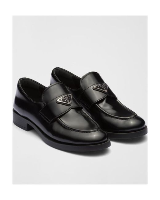 Prada Black Logo Plaque Almond-Toe Loafers