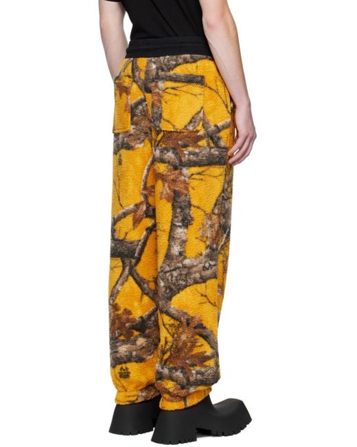 Moose Knuckles Yellow Graphic-Print Fleece Track Pants for men