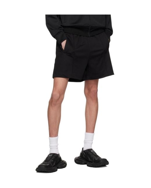 Palm Angels Black Curved Logo Track Shorts for men