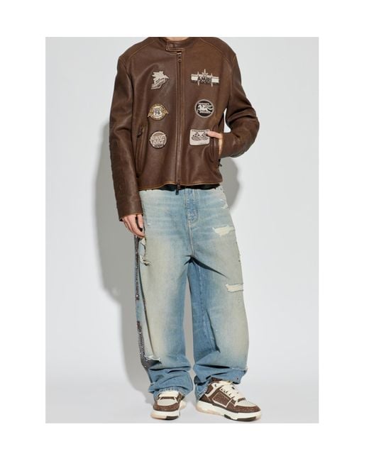Amiri Blue Distressed Embellished Jeans for men