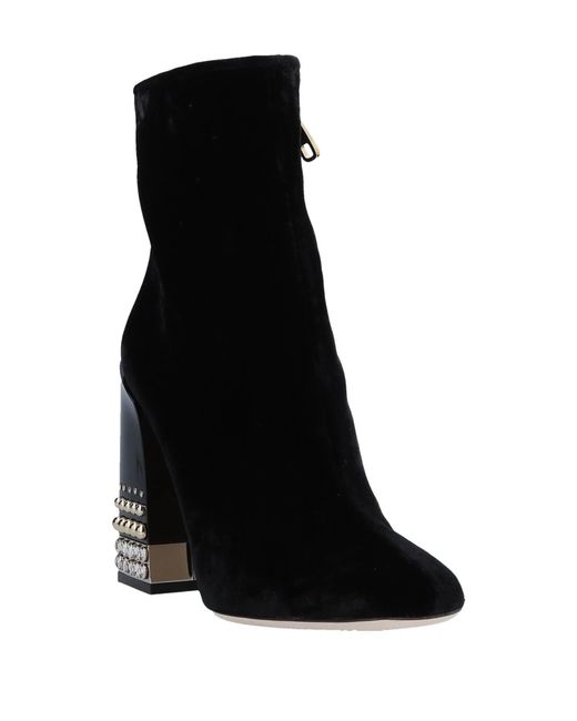 Dolce & Gabbana Black Solid Color Ankle Boots