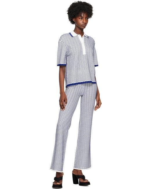 REMAIN Birger Black Striped Flared Casual Pants
