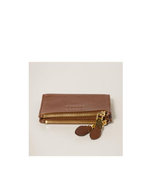 Miu Miu Brown Logo Embossed Zipped Wallet