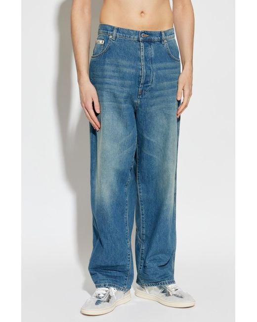 Moschino Blue Vintage Effect Logo Patch Jeans for men
