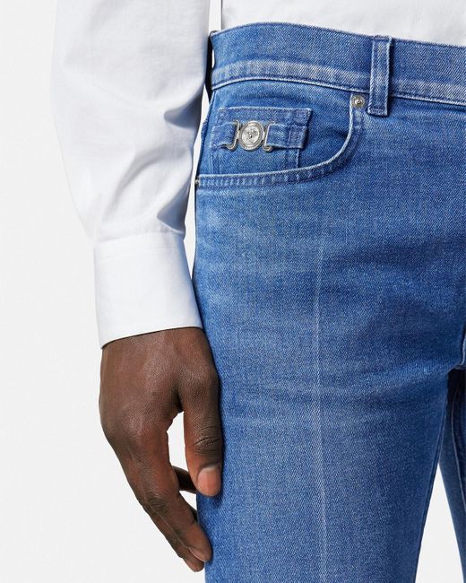 Versace Blue Logo-Patch Slim-Cut Denim Jeans for men