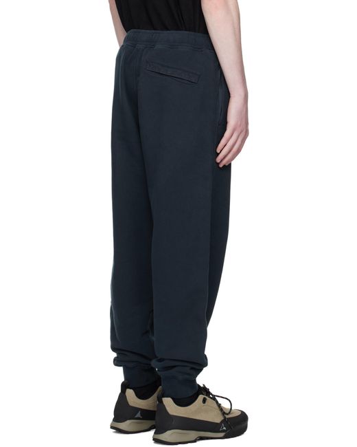 Stone Island Blue Logo Patch Tapered Leg Pants for men