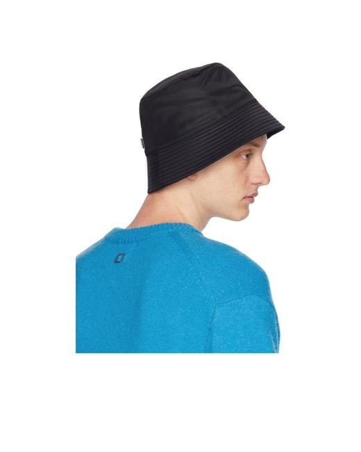 Wooyoungmi Blue Logo Embroidered Bucket Hat for men