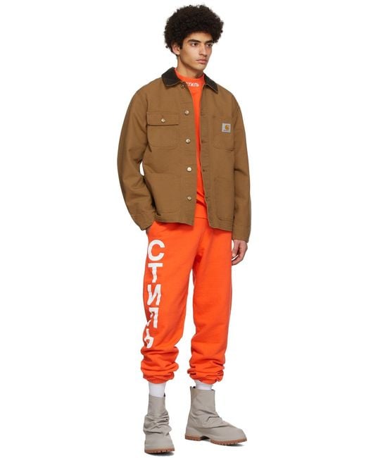Heron Preston Orange Logo Print Elasticated-Waist Track Pants for men