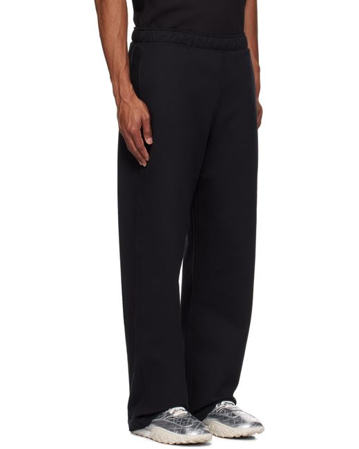MARINE SERRE Black Crescent Moon Embroidered Track Pants for men