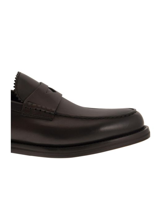 Doucal's Black Penny Slip-On Loafers for men