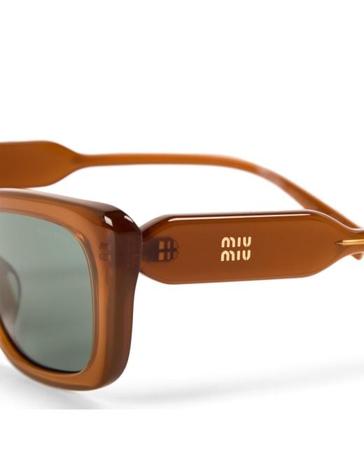Miu Miu Metallic Logo Detail Sunglasses