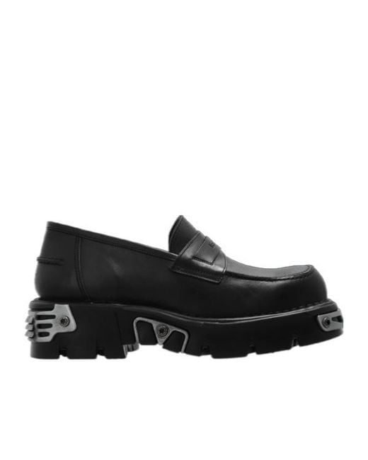 Vetements Black Logo-Embossed Leather Loafers for men