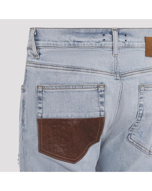 Amiri Blue Mx1 Distressed Slim Jeans for men