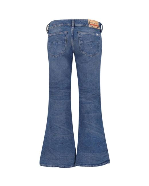 DIESEL Blue Flared Distressed Jeans