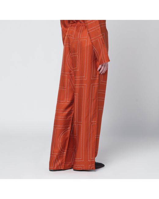Totême Orange Monogram Silk Pajama Trousers