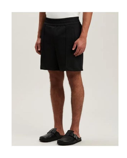 Palm Angels Black Curved Logo Track Shorts for men