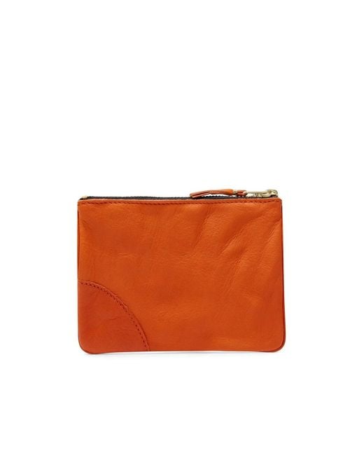 Comme des Garçons Orange Comme Des Garçons Wallet Logo Printed Zip-Up Wallet for men