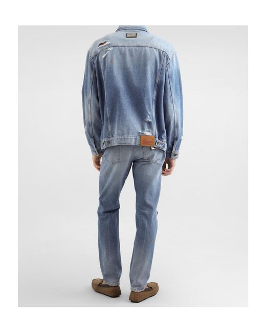 Dolce & Gabbana Blue Ripped Logo-Plaque Jeans for men