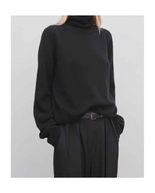 The Row Black Turtleneck Sweater