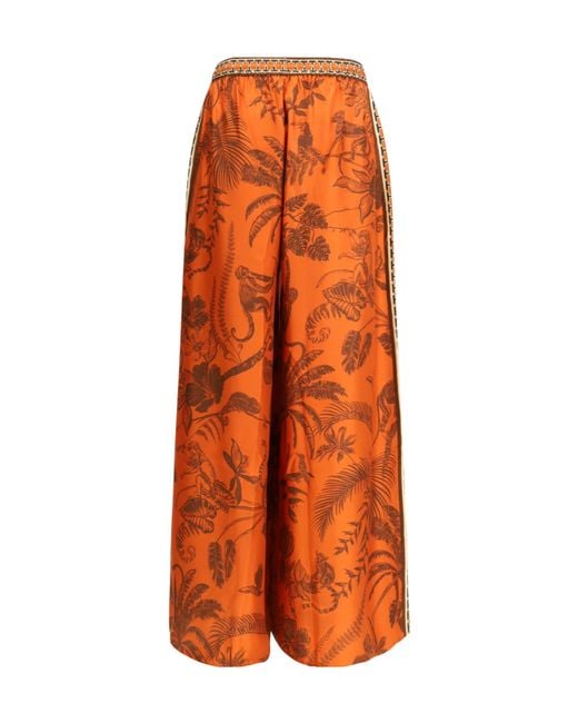 ALÉMAIS Orange Monkey Dance Printed Palazzo Pants
