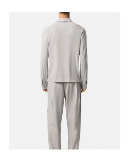 Stone Island White Slim-Fit Long-Sleeve Polo With Tonal Compass Patch for men