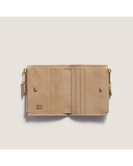 Miu Miu Natural Logo Embossed Zipped Wallet