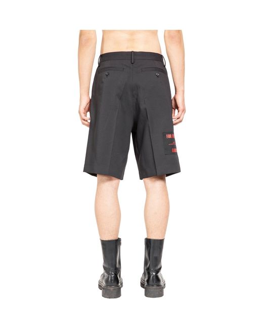 Undercover Black Graphic Patch Bermuda Shorts for men