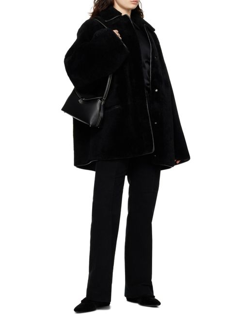 Totême  Black Totême Logo Plaque Foldover Top Handle Bag