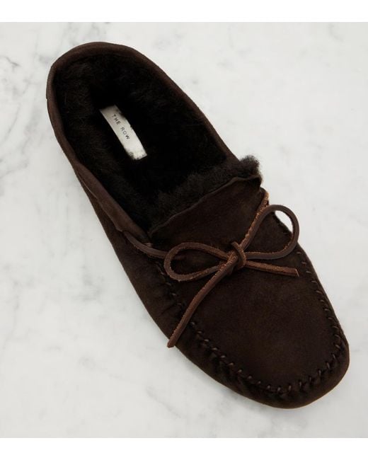 The Row Black Lucca Shearling-Trimmed Suede Boat Shoes