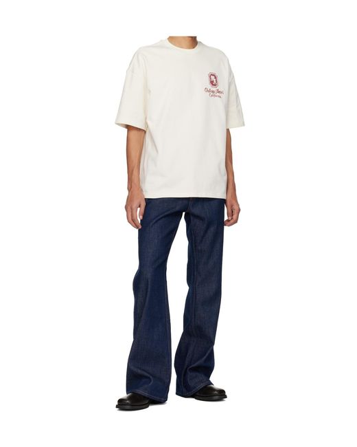 Amiri Blue Raw Boot Cut Jeans for men