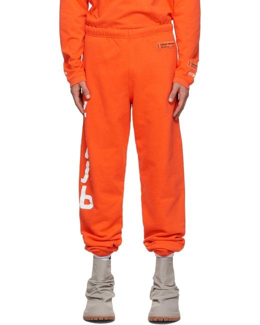 Heron Preston Orange Logo Print Elasticated-Waist Track Pants for men