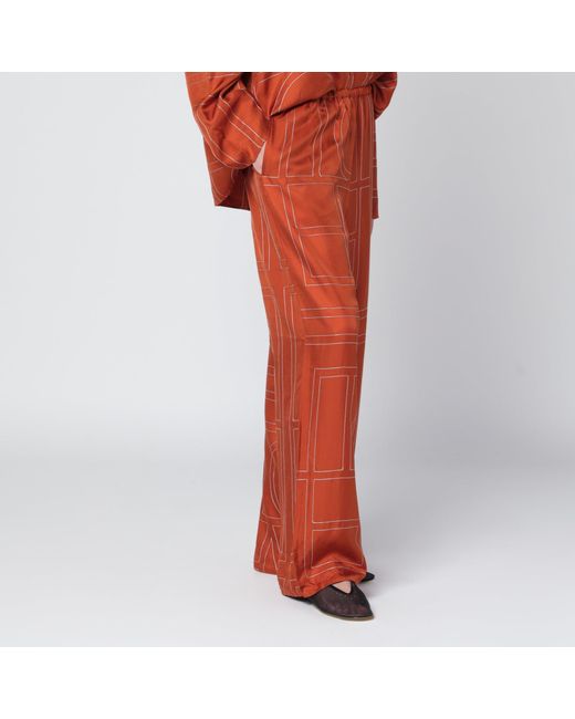 Totême Orange Monogram Silk Pajama Trousers