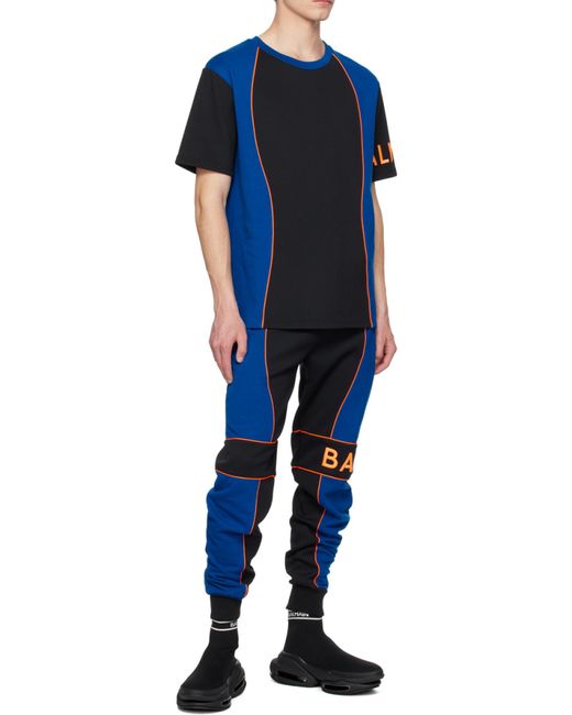 Balmain Blue Jogging Bottoms With Logo Inserts for men