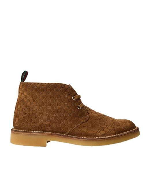 Gucci Brown Logo Embossed Ankle Boots for men
