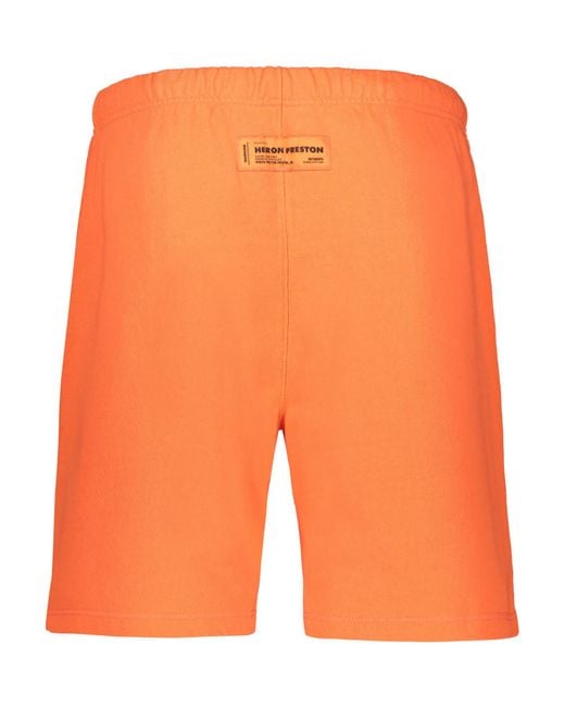 Heron Preston Orange Logo Printed Shorts for men