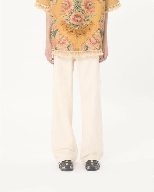 Valentino Natural Logo Plaque Straight Leg Jeans for men