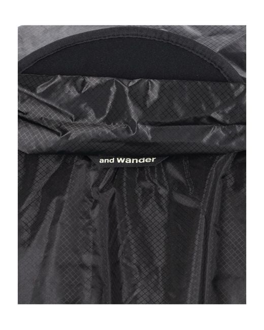 And Wander Black Drawstring Hooded Raincoat for men