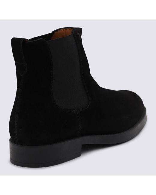 Tod's Black Round Toe Chelsea Boots for men