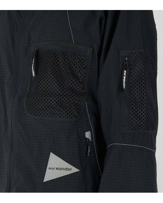 And Wander Black Breath Rip Hooded Jacket for men