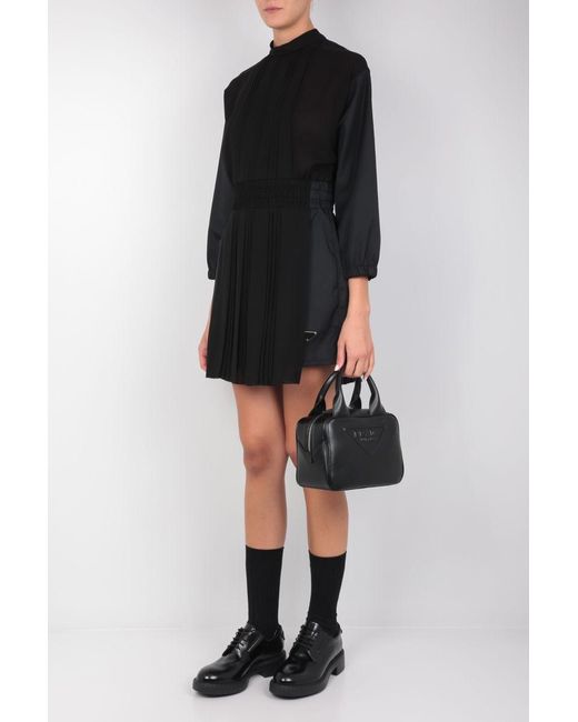 Prada Black Logo Plaque Long Sleeved Pleated Playsuit