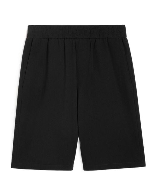 AMI Black Logo Plaque Bermuda Shorts for men